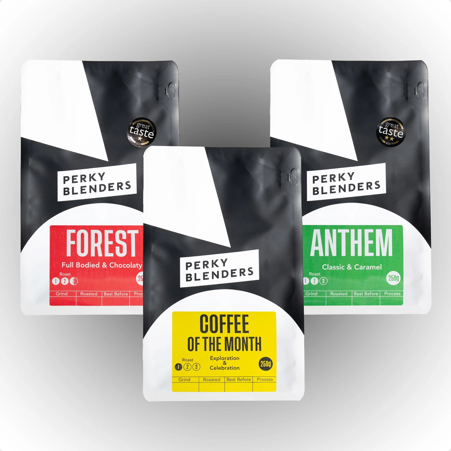 Four coffee packages from Perky Blenders on a gray background
